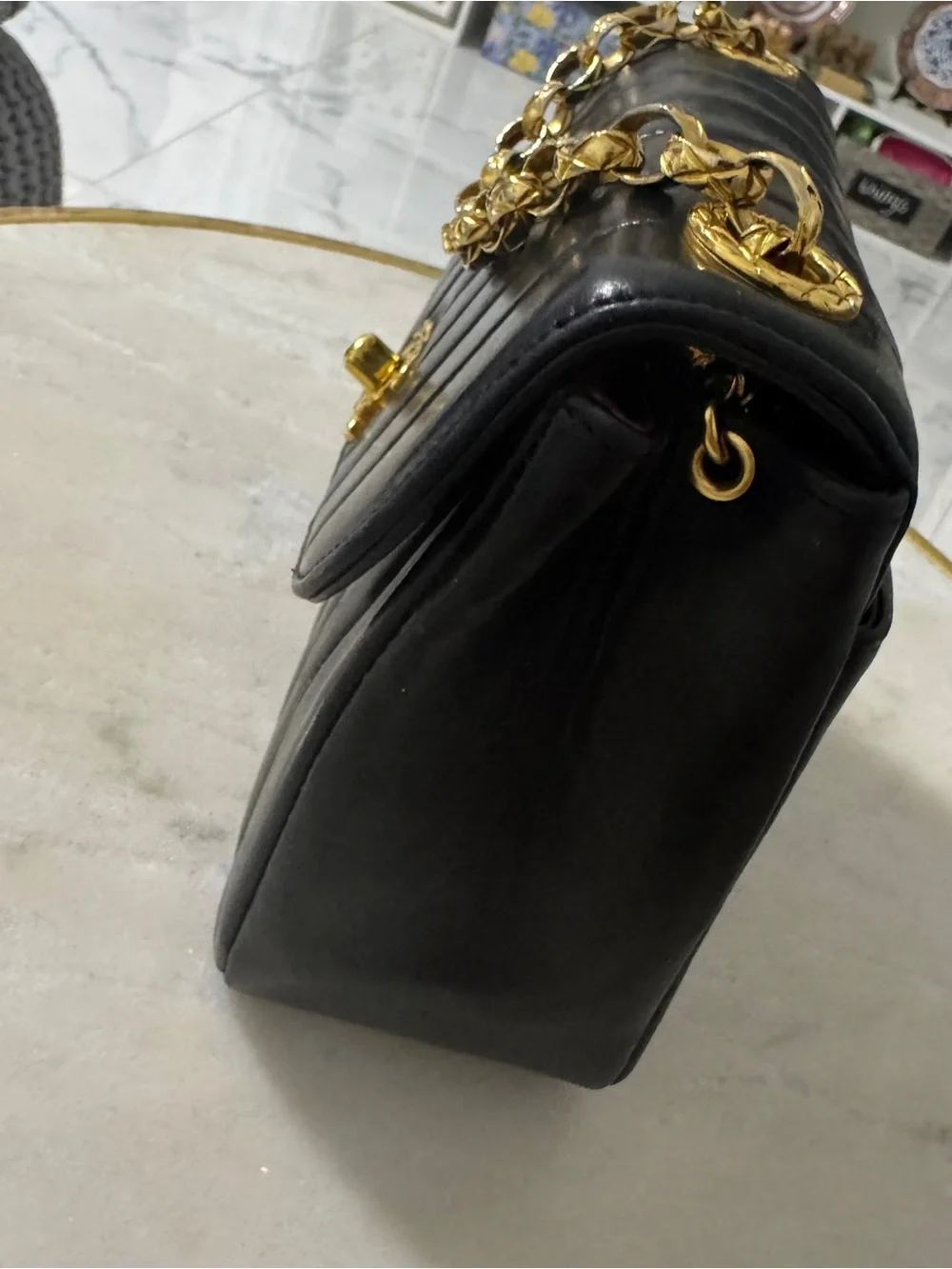 CHANEL Black Vertical Quilted Lambskin Shoulder Bag with Gold Hardware